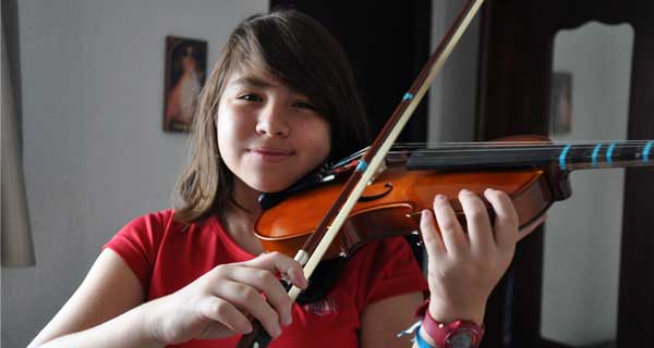 Jeune violoniste et syndrome de surmenage